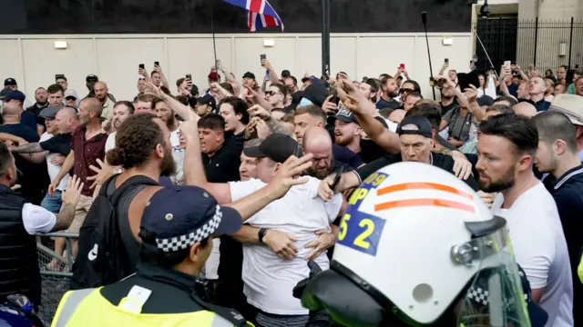 Police clash with protesters in central London