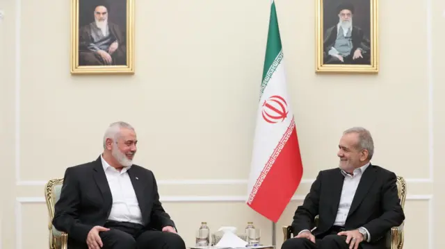 Iranian President Masoud Pezeshkian meets with Palestinian group Hamas' top leader, Ismail Haniyeh in Tehran, Iran.