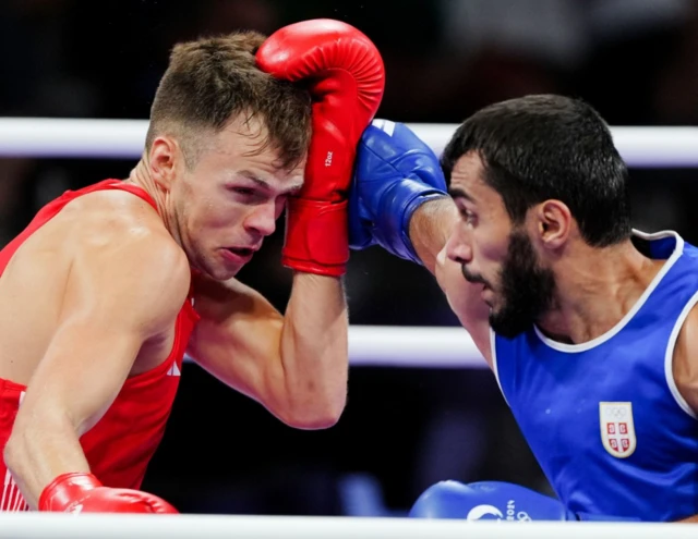 Lewis Richardson (left) in action against Serbia's Vakhid Abbasov