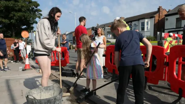 Volunteers in Southport this morning