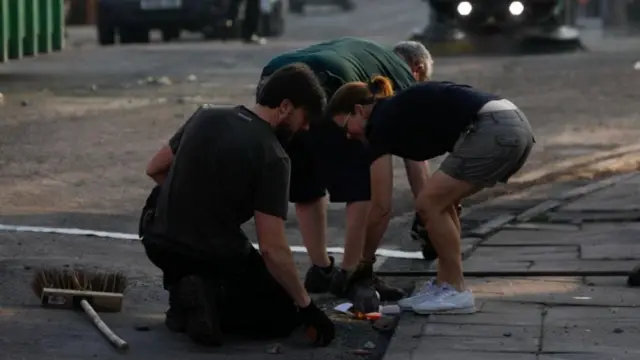 Volunteers cleaning up