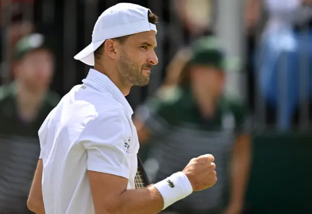 Dimitrov celebrates