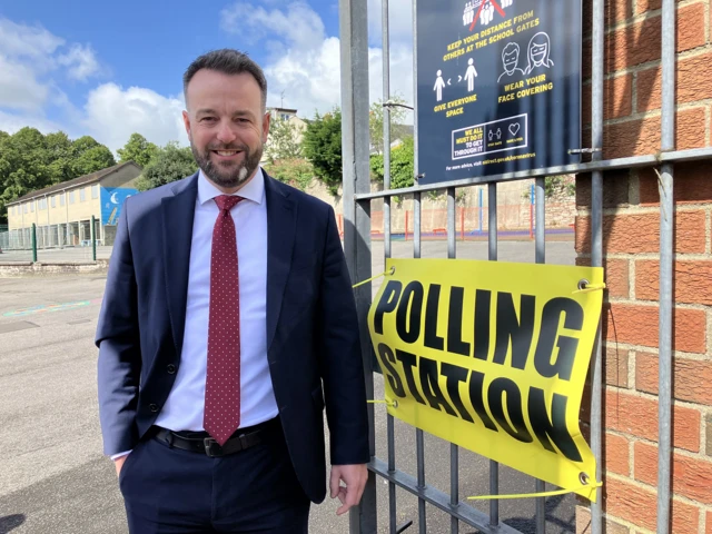 Social Democratic and Labour Party (SDLP) leader Colum Eastwood votes at Model Primary School in Londonderry