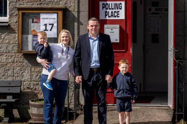 Douglas Ross with his family outside Fogwatt Hall polling station