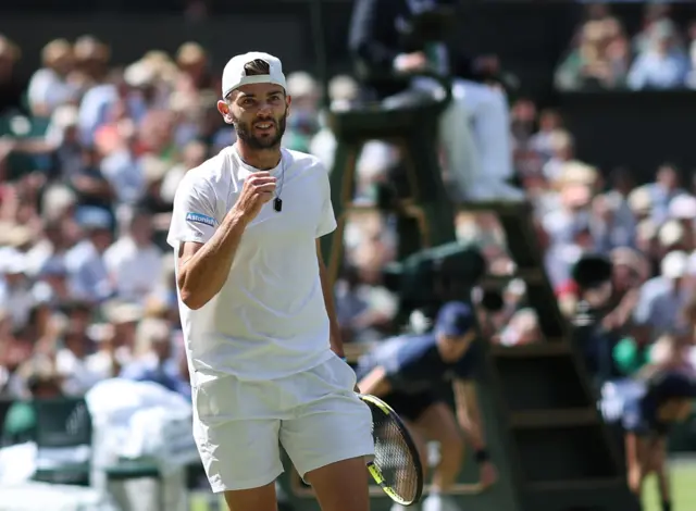 Jacob Fearnley clenches his fist in celebration