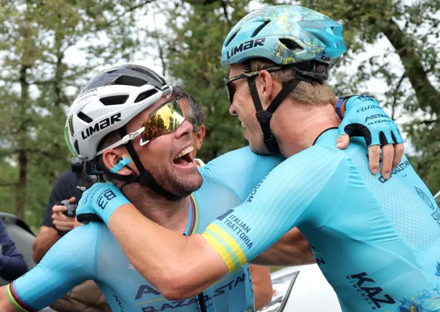 Mark Cavendish hugs team-mate Cees Bol after winning stage five of the 2024 Tour de France