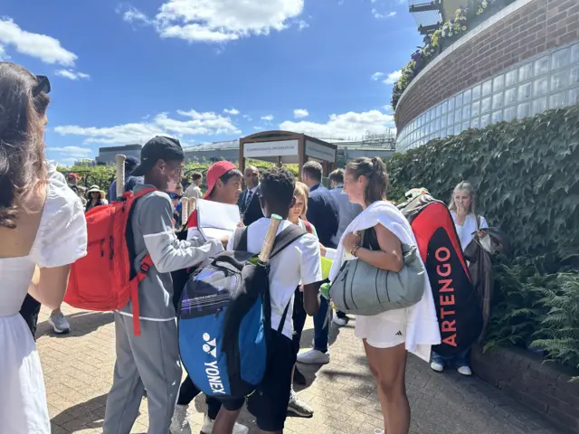 Daria Kasatkina signing books