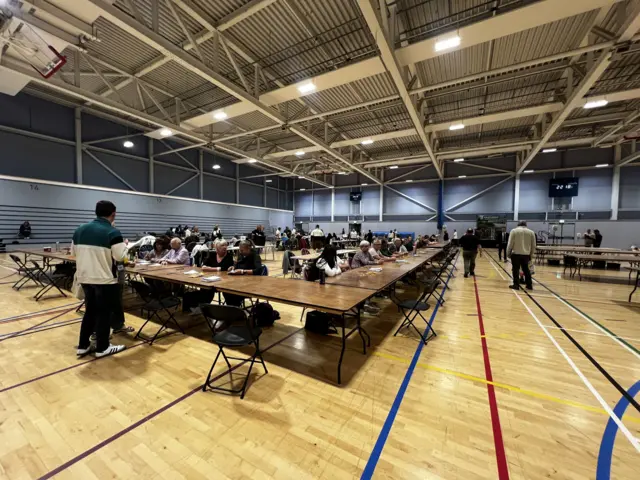 Vote counting in a sports hall in Eastleigh