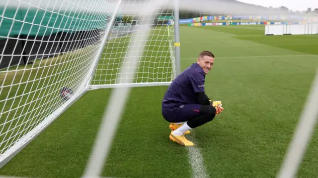 Jordan Pickford of England smiles during a training session at Spa & Golf Resort Weimarer Land on June 13,