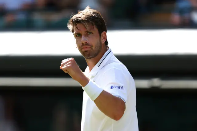 Cameron Norrie clenches his fist in celebration