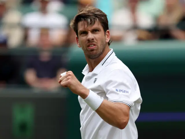 Cameron Norrie pumps his fist in celebration