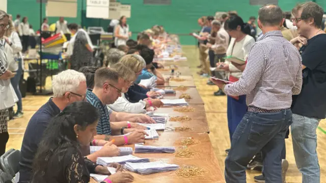 Volunteers sorting ballots in the Wycombe count