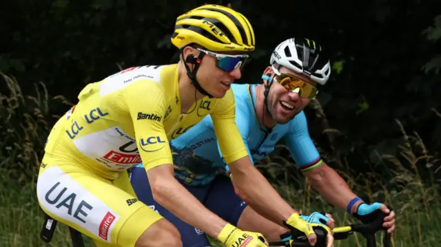 Tadej Pogacar speaking to Mark Cavendish during stage five of the 2024 Tour de France