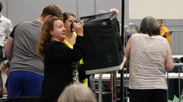 Ballot boxes arriving