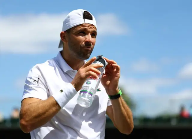 Dimitrov drinks water