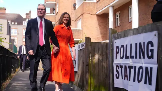 Labour leader Sir Keir Starmer and his wife Victoria arrive to cast their votes