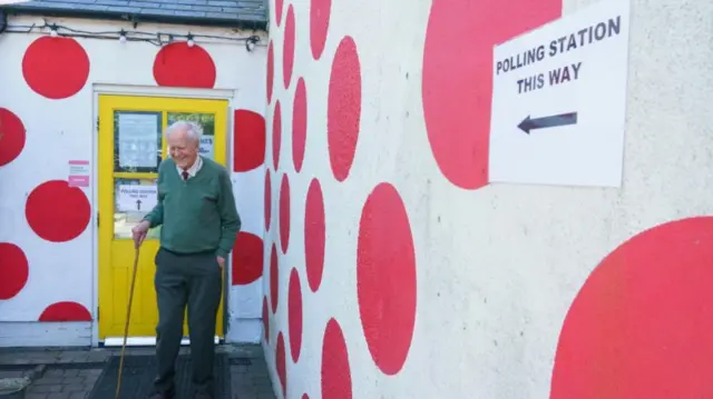 A man leaving a polling station