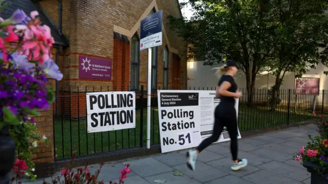 Person running in front of polling station located at a church