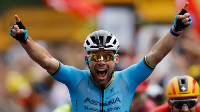 Mark Cavendish celebrates winning stage five of the 2024 Tour de France