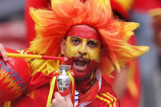 Spanish fan in the crowd with face paint