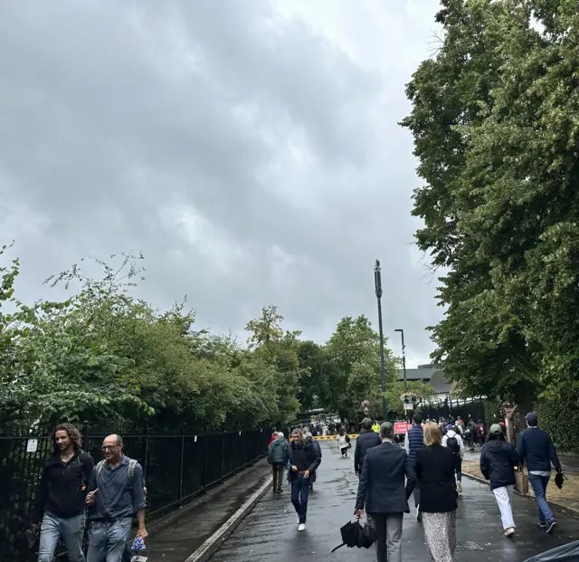 People walk to Wimbledon