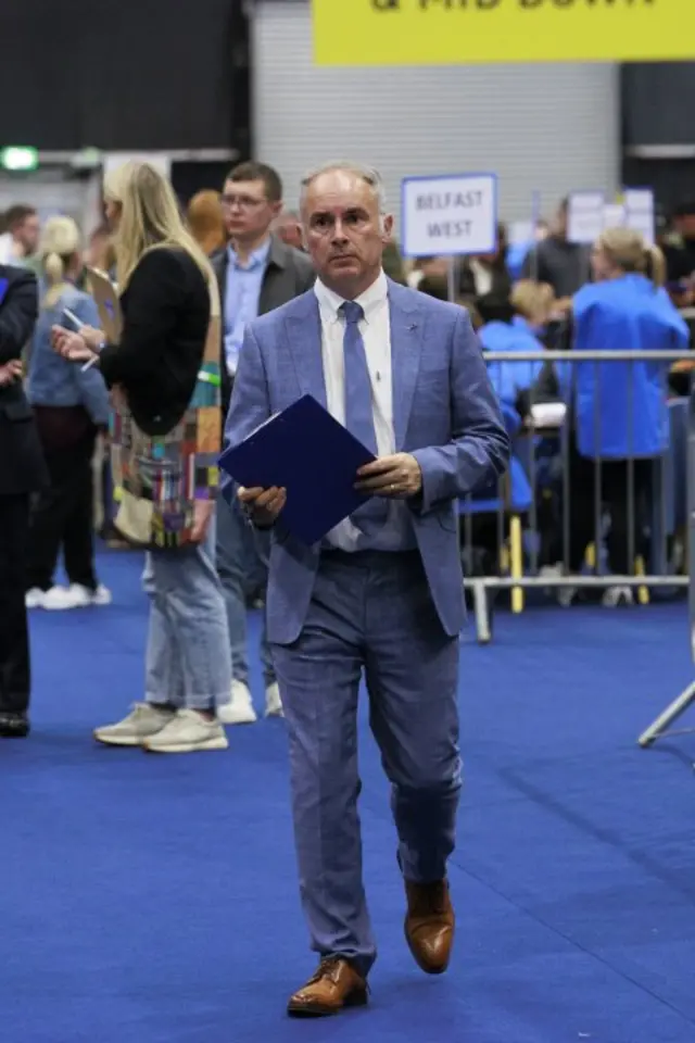 Alex Easton walking at polling station