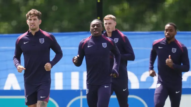 England's John Stones and Eberechi Eze at a training session at Spa & Golf Resort Weimarer Land during the 2024 UEFA European Football Championship in Blankenhain, Germany