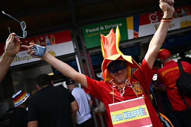 A Spain's supporter arrives at the stadium ahead