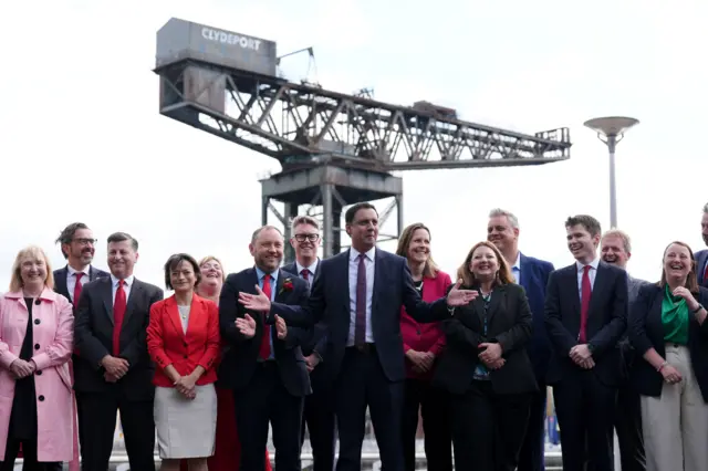 Anas Sarwar with newly elected Scottish Labour MPs in front of the Finnieston crane