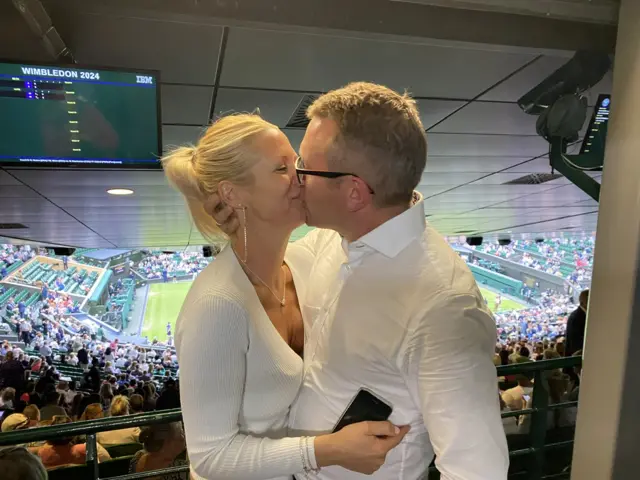 Paul Rowan kisses new fiancee Amy on Wimbledon's Centre Court