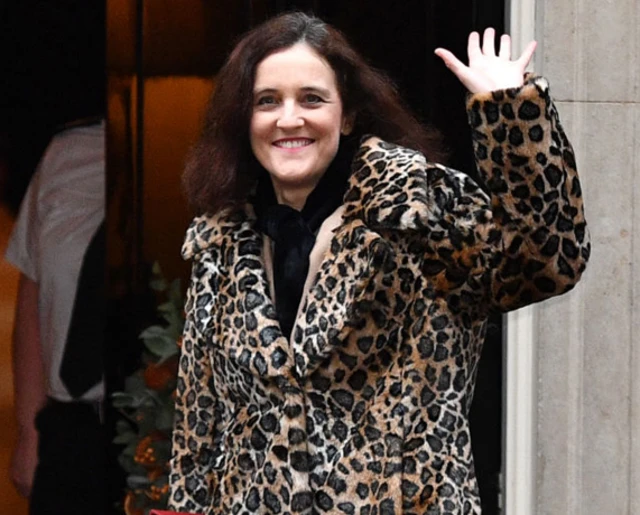 Theresa Villiers waving outside Downing Street