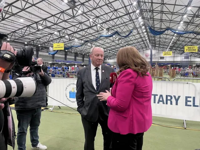 Jim Alistair speaking to BBC at polling centre