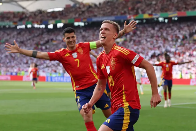 Dani Olmo of Spain celebrates scoring his team's first goal with teammate Alvaro Morata