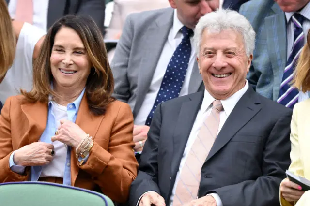 Dustin and Lisa Hoffman smile in the Royal Box