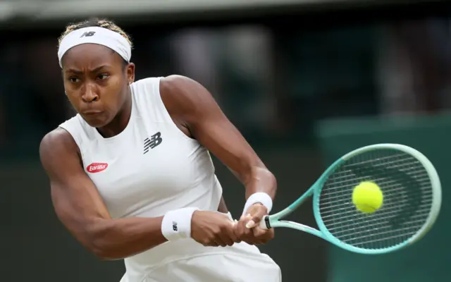 Coco Gauff hits a backhand shot