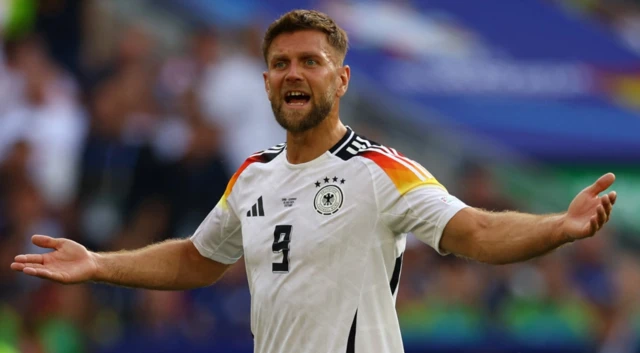 Germany's Niclas Fullkrug reacts