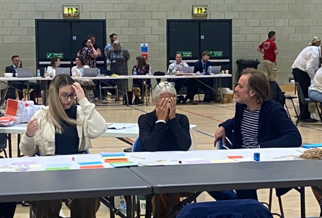 Count in Norwich South, woman with hands over face