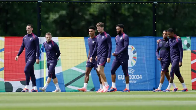 England's John Stones, Kieran Trippier with Ollie Watkins and teammates during training