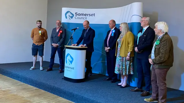 candidates standing on a stage