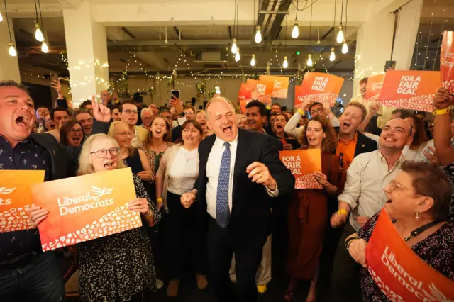 Ed Davey celebrating with Lib Dem members