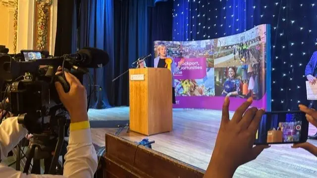 Lib Dems’ Lisa Smart speaking at a dais