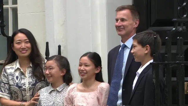 Jeremy Hunt with his wife and children outside No 11