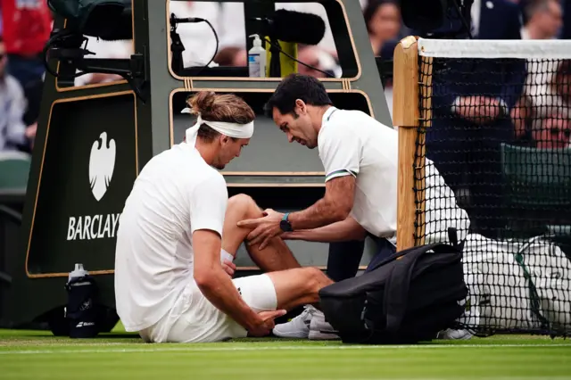 Zverev is seen to by a medic