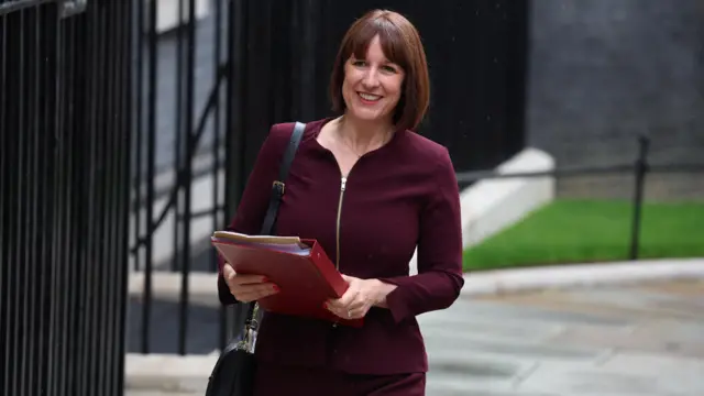 Rachel Reeves outside Downing Street carrying a binder