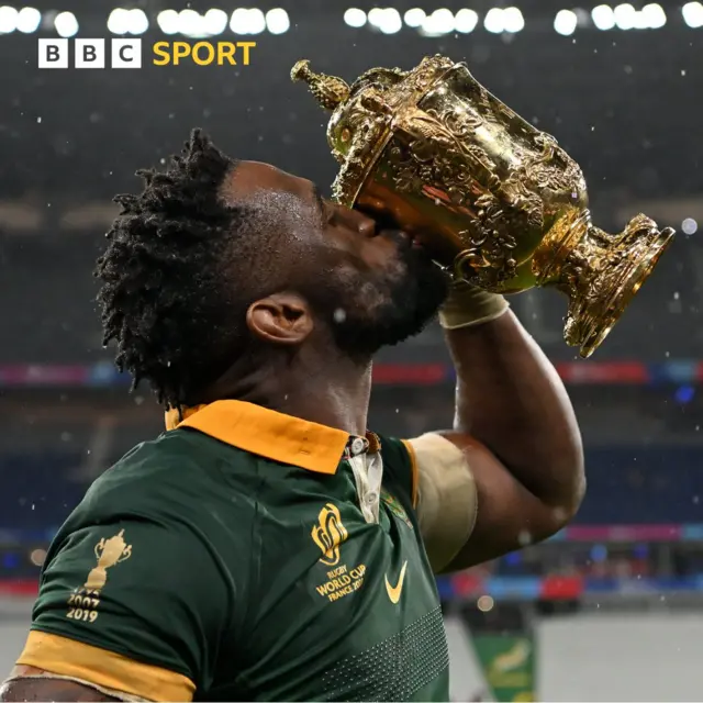 Siya Kolisi kisses the Rugby World Cup trophy