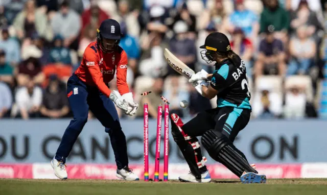 Suzie Bates is bowled by Sarah Glenn