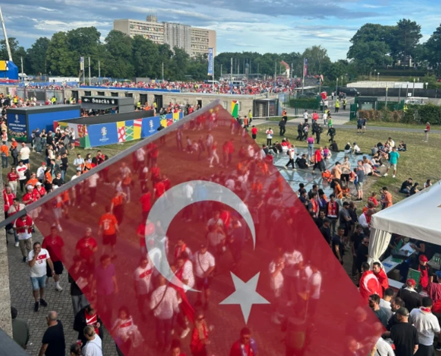 Turkey flag among a crowd of people in Berlin