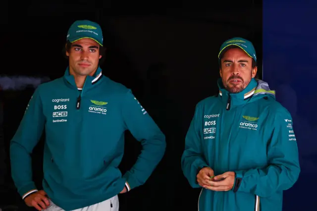 Lance Stroll and Fernando Alonso