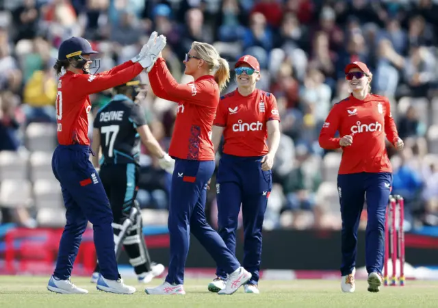 Sarah Glenn celebrates the wicket of Sophie Devine