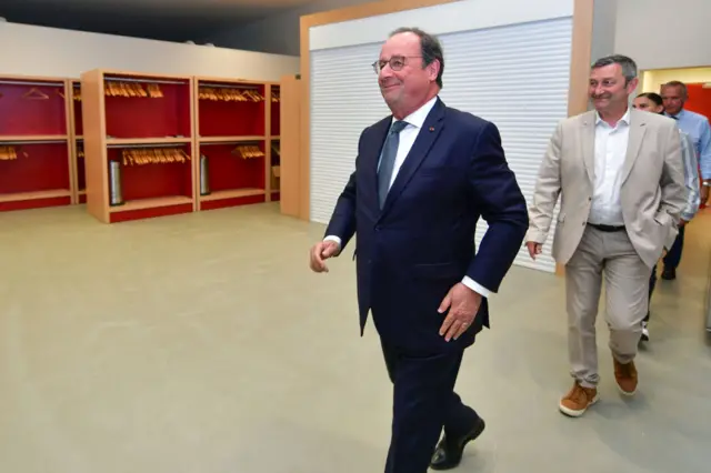 Former French president and socialist newly elected Member of Parliament Francois Hollande (L) arrives to attend in an election night event following the first results of the second round of France's legislative election in Tulle on July 7, 2024.